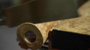 carpenter sawing a workpiece with a Japanese saw video