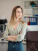 Young woman working on a computer photo