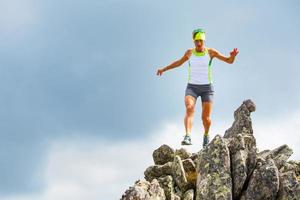 Female athlete running trail photo