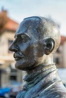 Bronze statue of the photographer Alexandru Rosu in Bistrita Transylvania Romania on September 17, 2018 photo