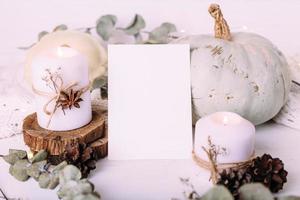 Autumn composition mockup, cocoa, marshmallows, cookies, pumpkin and candles photo