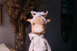 toro y vaca de muñeca hechos a mano originales del autor con una hermosa cara pintada foto