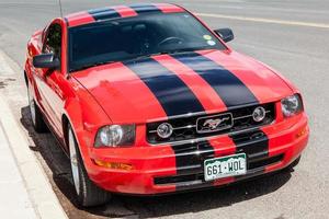 Old Mustang parked in Seligman Arizona on July 31, 2011 photo