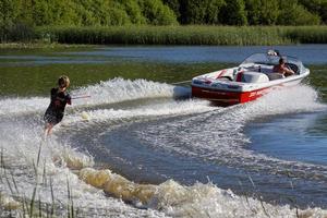 Water skiing at Wiremill Lake near Felbridge Surrey on May 29, 2009. Unidentifed people. photo