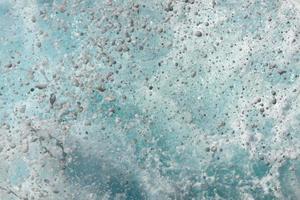 Sea spray from a wave hitting the seashore in Tenerife photo