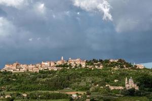 View of Montepulciano and San Biagio under Stormy Conditions photo