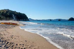 A summer evening at Hahei beach in New Zealand photo