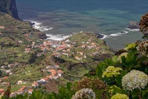 View of Porto da Cruz Madeira from a ridge near Portella in Madeira on April 12, 2008 photo