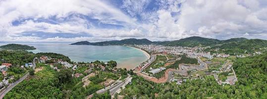 Phuket Thailand patong bay. Panorama landscape nature view from Drone camera. Aerial view of patong city in phuket thailand. Beautiful sea in summer sunny day time photo