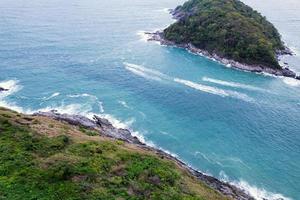 Aerial view of seashore with blue ocean Turquoise sea surface Amazing seascape waves in Phuket Thailand photo