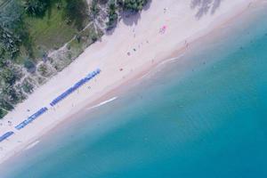 Phuket Thailand Aerial view sandy beach and waves Beautiful tropical sea in the morning summer season image by Aerial view drone shot, high angle view Top down photo