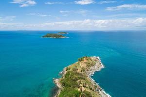 Amazing landscape nature scenery view of Beautiful tropical sea with Sea coast view in summer season image by Aerial view drone top down, high angle view Located at Laem Promthep Phuket Thailand photo