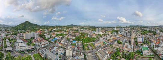 Phuket Thailand on May 22-2022 Aerial view drone photography High angle view of Phuket city, Phuket province Thailand. Panorama of phuket city thailand in sunset or sunrise sky background photo