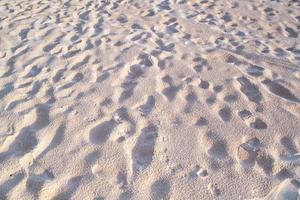 Detail of texture sand in tropical island Summer background and travel design High Quality Detail Of Curve sand texture with sunset or sunrise light on sand beach photo
