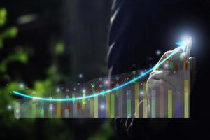 Business man pointing graph for success  growing growth.network,media,Digital Web,network,media,communication icon,Digital Web,Photo concept of business and Technology. photo