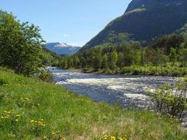 The small village Eidfjord in the norwegian Hardangerfjord photo