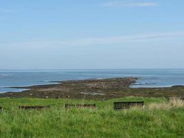 Garden and coastline near newcastle in england photo