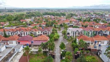 aerial drone view of Indonesian suburban neighborhood photo