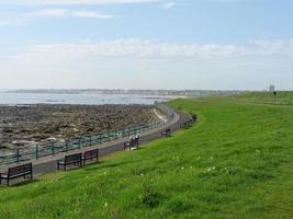 Garden and coastline near newcastle in england photo