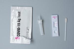 Rapid Antigen Test kit with Negative result during swab COVID-19 testing. Coronavirus Self nasal or Home test, Lockdown and Home Isolation concept photo