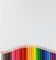 Colorful pencil on white paper photo