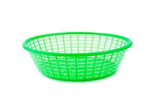 Green plastic basket on a white background photo