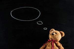 teddy bear with blackboard , background photo