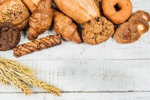 bakery on wood white background different types of bread photo