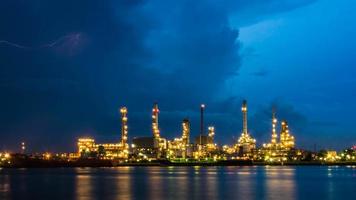 Oil refinery at night , Chao Phraya river, Thailand photo