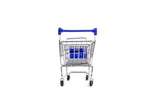 Classic Shopping cart trolley on white background photo