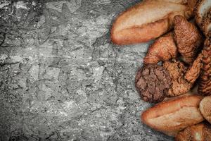 bakery on wood white background different types of bread photo