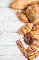 bakery on wood white background different types of bread photo