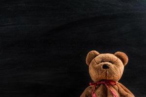 teddy bear with blackboard , background photo