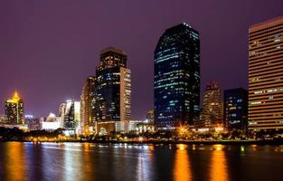 Building at night Night view of Bangkok from lake Ratchada photo