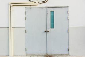 Emergency Fire Exit Doors of Parking Buildings Near Business Offices photo