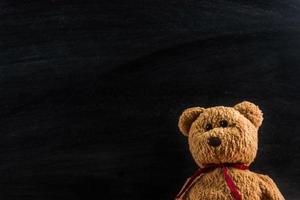 teddy bear with blackboard , background photo