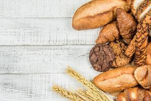 bakery on wood white background different types of bread photo