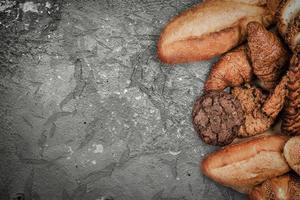 bakery on wood white background different types of bread photo