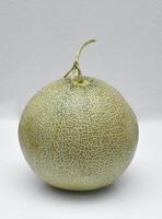 Japanese melons on a white background photo