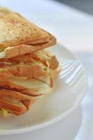 Toast on a white plate on a white background photo