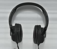 Headphones with wires on a white background photo