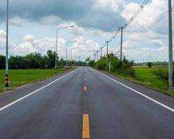 Road with electric poles. photo