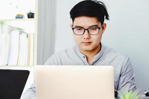 Work from home Company employees use their computers to work from home to prevent the corona virus from meeting outsiders. photo