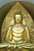 Meditating Buddha in Sitting Position photo