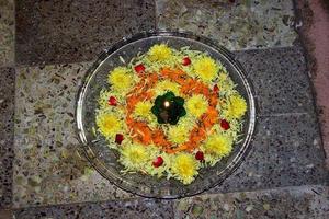 Floral Arrangement on Glass Dish photo