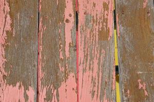 Old wooden background has peeling paint. photo