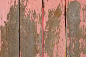 Old wooden background has peeling paint. photo