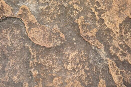 stone background was eroded by the wind creating a beautiful pattern. marble background with text photo