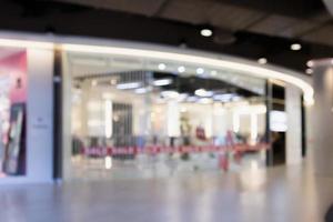 Abstract blur modern shopping mall interior defocused background photo