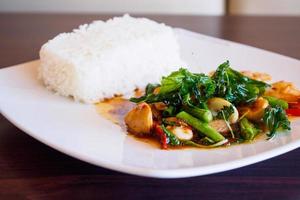 Rice with stir-fried seafood and basil photo